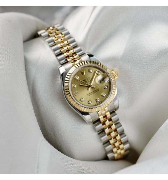 Đồng Hồ Rolex Nữ 179174 mặt vàng trải tia, cọc số kim cương